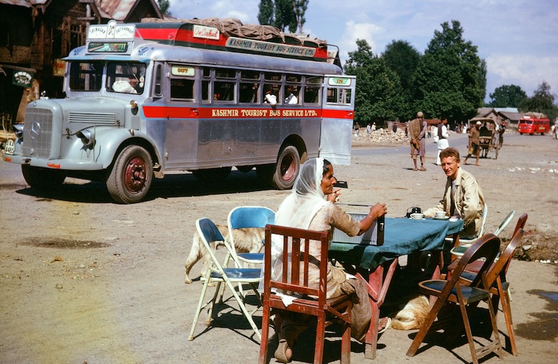 The author seated at right at a tea stop en route to Kashmir.
